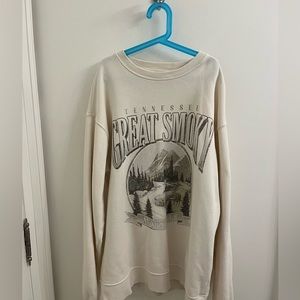 Light cream graphic sweater from Ardene